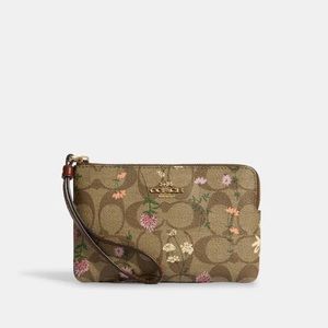 Coach Corner Zip Wristlet In Signature Canvas With Wildflower Print